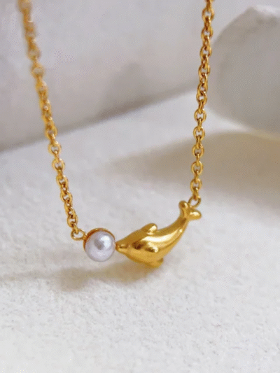 Playing dolphin necklace