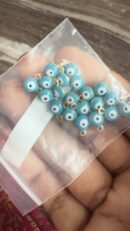 Evil eye round sky blue