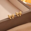 Mini bow ear studs